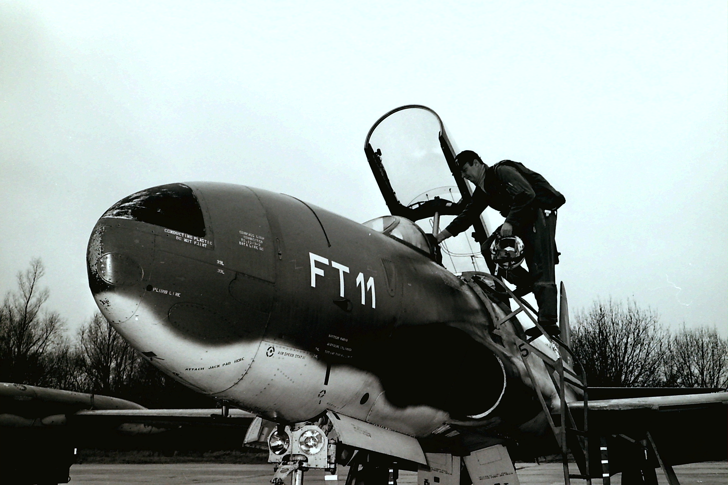 T 33  FT11 Cdt Verbruggen Entering Cockpit